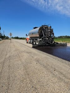 Tarmac road construction on a sunny day in Marsing, Idaho.