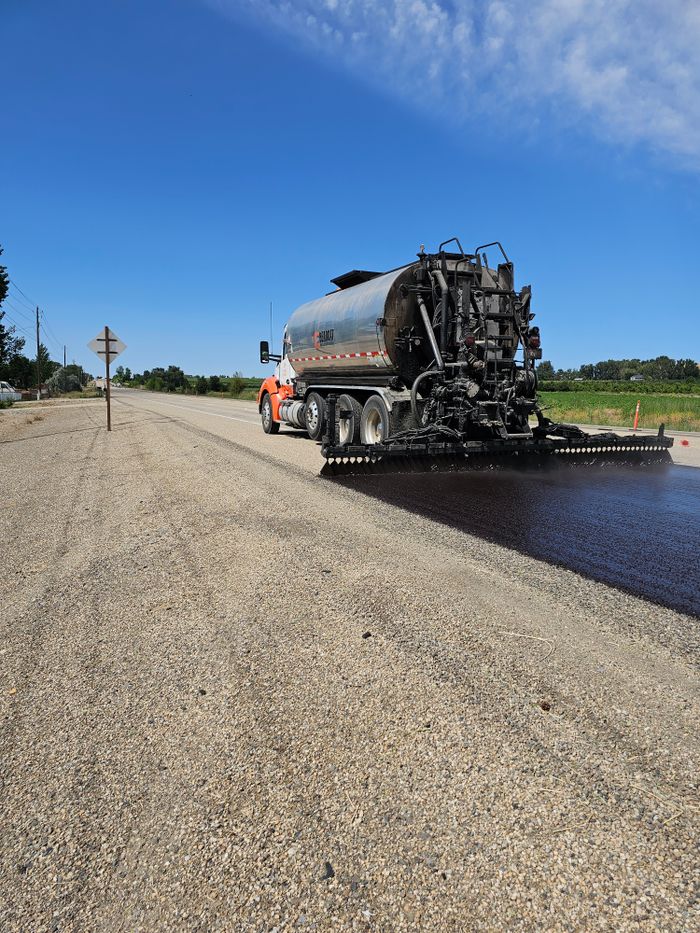 Tarmac road construction on a sunny day in Marsing, Idaho.